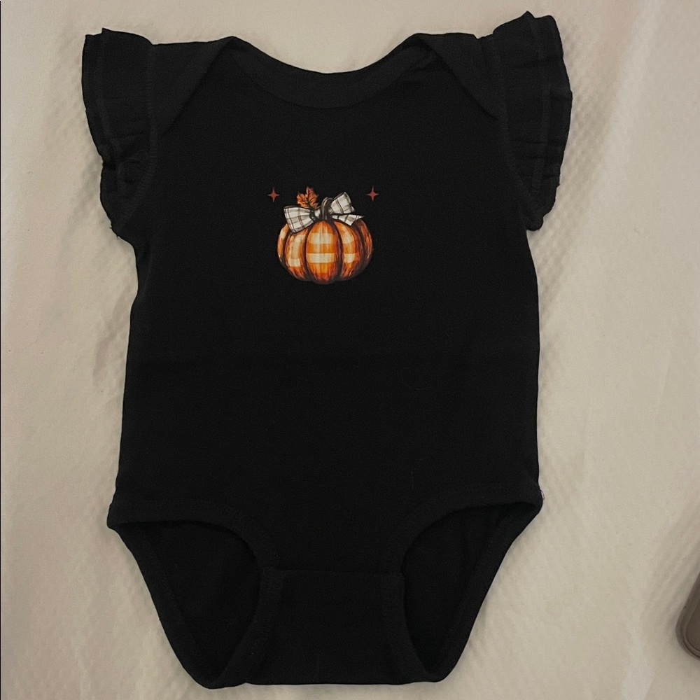 Black Onesie with Plaid Pumpkin and Bow Graphic